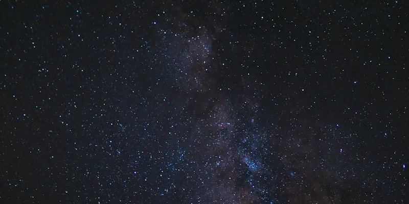 Sun, moon and stars over the night horizon